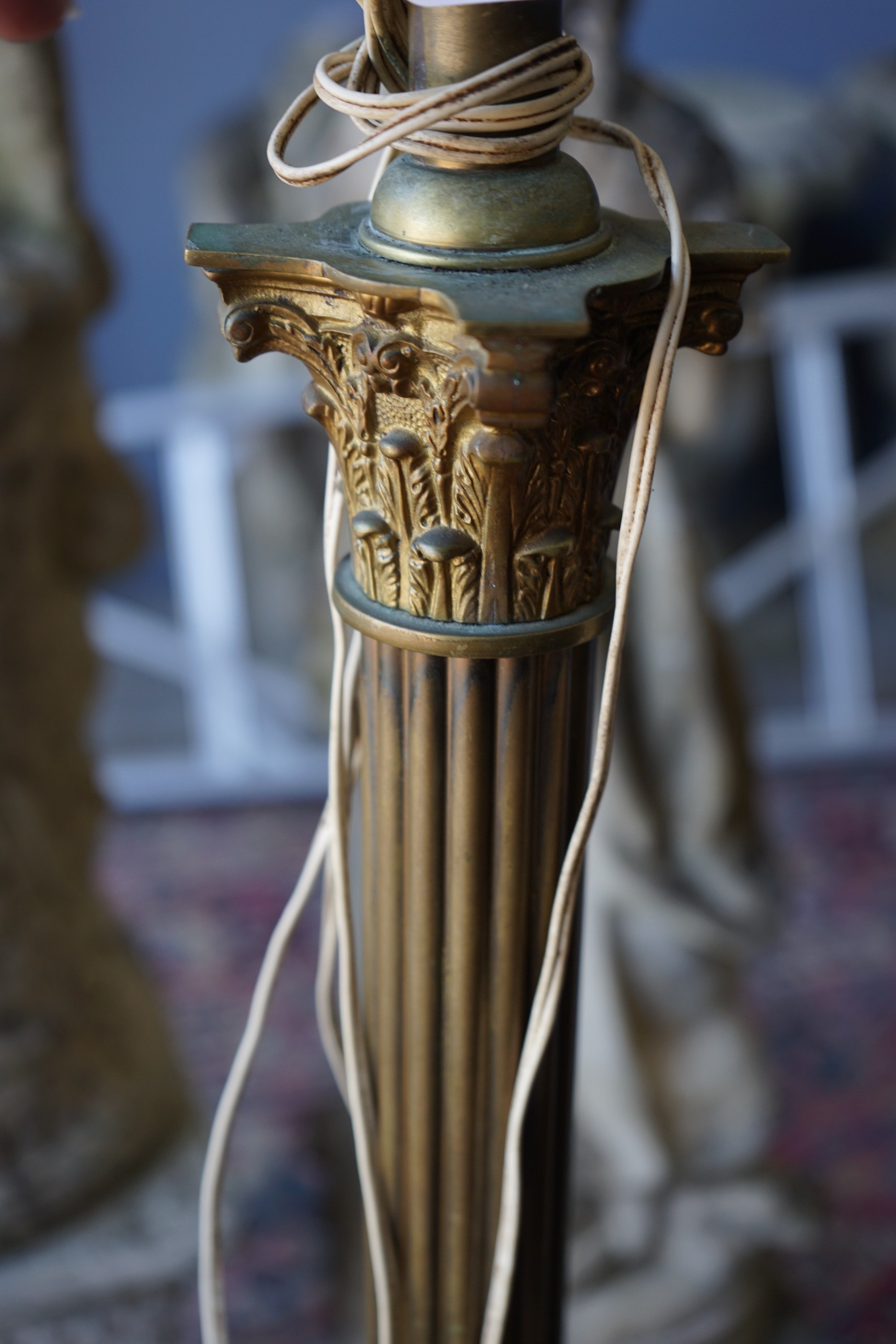 A 20th century brass Corinthian column telescopic standard lamp